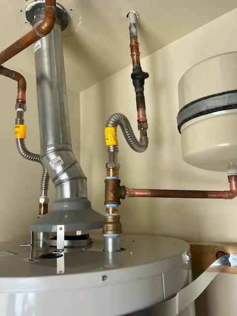 Water heater installation and plumbing repair in Schick